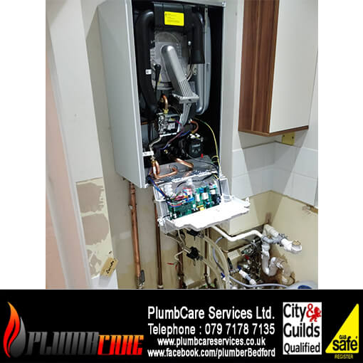 boiler installation with powerflush bedfords plumber